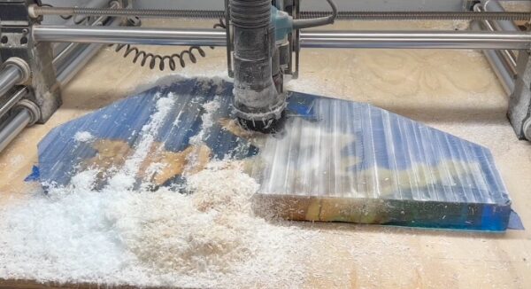 making a blue coral leaf made with deep pour epoxy resin and olivewood